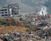 This image obtained from Twitter purportedly shows destroyed buildings on January 12, 2010 in Port-au-Prince after a huge earth quake measuring 7.0 rocked the impoverished Caribbean nation of Haiti, toppling buildings and causing widespread damage and panic, officials and AFP witnesses said.  A tsunami alert was immediately issued for the Caribbean region after the earthquake struck at 2153 GMT.     AFP PHOTO /  TWITTER      == RESTRICTED TO EDITORIAL USE / NO SALES  ==