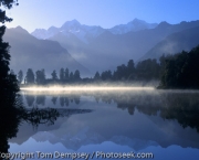 Reflections of Mounts Cook and Tasman in Lake Matheson.